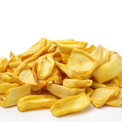 Close up of a pile of dried jackfruit chips isolated on white background