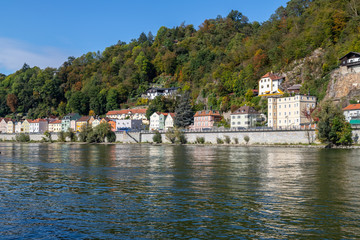Fototapeta na wymiar View at a house front on the Danube river in Passau, Bavaria, Germany