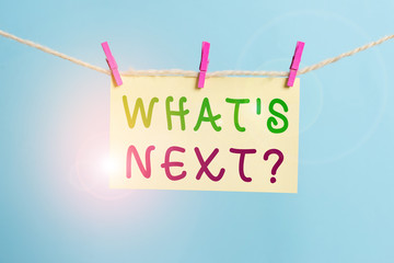 Word writing text What S Next Question. Business photo showcasing asking demonstrating about his coming actions or behaviors Clothesline clothespin rectangle shaped paper reminder white wood desk