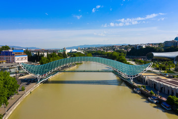 Bridge of Peace in Tbilisi, Geaorgia, bow-shaped pedestrian bridge over the Kura River in Tbilisi, capital of Georgia. One of the most important sites of Tbilisi.