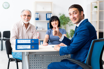 Financial advisor giving retirement advice to old couple