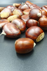 chestnuts isolated on black background