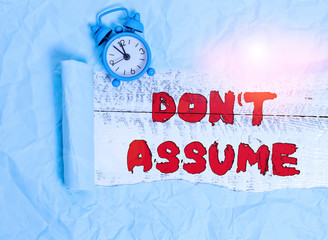 Conceptual hand writing showing Don T Assume. Concept meaning do not accept something to be true...