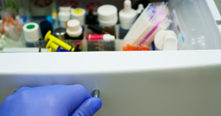 Open medicine cabinet in a medical clinic