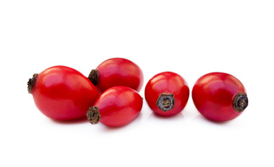 Ripe rose hip isolated on white background