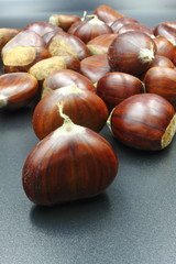 chestnuts isolated on black background