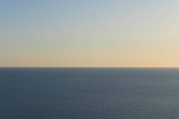 Sea before sunset. Sea horizon at sunset .