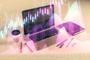 Forex graph hologram with desktop office computer background. Double exposure. Concept of financial analysis.