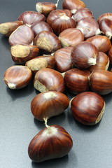 chestnuts isolated on black background