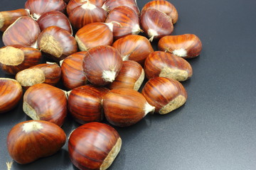 chestnuts isolated on black background