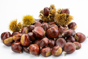 handful of chestnuts on white background