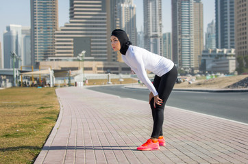 Arabian woman training outdoors