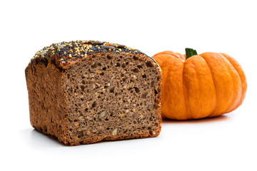 Homemade pumpkin wholemeal bread with chia seed and millet groats isolated on white