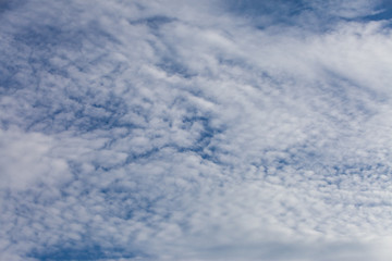 Blue sky background with clouds.