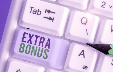 Handwriting text writing Extra Bonus. Conceptual photo an extra amount of money that is added to...