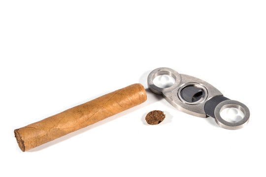 Cigar, And Scissors Close-up, On A White Background.