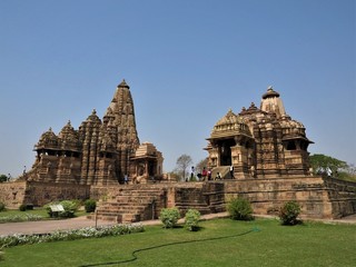 Fototapeta na wymiar Famous Indian tourist landmark - Kandariya Mahadev Temple, Khajuraho, India. Unesco World Heritage Site