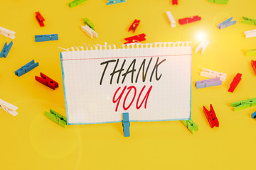 Writing note showing Thank You. Business concept for a polite expression used when acknowledging a...