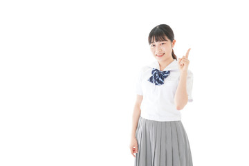 案内をする笑顔の女子学生