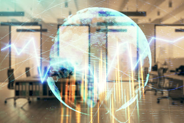 Stock and bond market graph and world map with trading desk bank office interior on background. Multi exposure. Concept of international finance