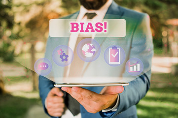 Writing note showing Bias. Business concept for inclination or prejudice for or against one...