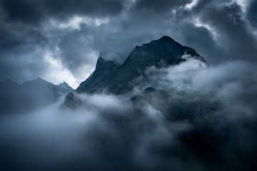 Tatras high mountain pass in gramatic atmosfere.