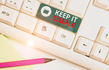Writing note showing Keep It Simple. Business concept for to make something easy to understand and...