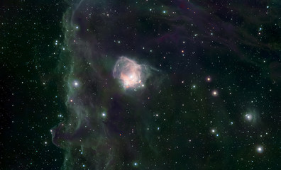 Obraz na płótnie Canvas Stars, dust and gas nebula in a far galaxy space background. Stellar nursery