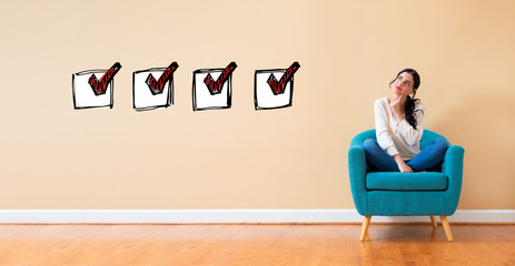 Checklist with woman in a thoughtful pose in a chair