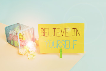 Handwriting text Believe In Yourself. Conceptual photo common piece of advice that you can do everything Trash bin crumpled paper clothespin empty reminder office supplies tipped