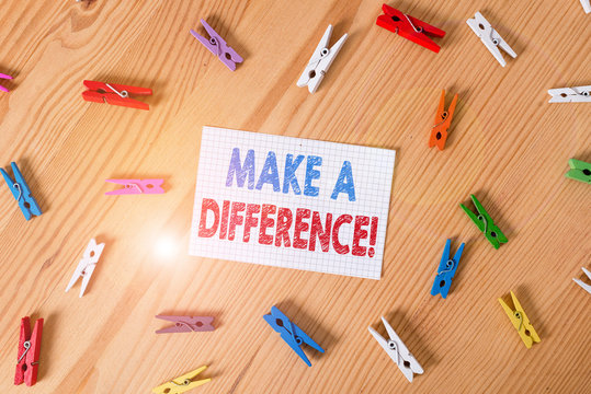 Handwriting text writing Make A Difference. Conceptual photo have significant effect or non on demonstrating or situation Colored clothespin papers empty reminder wooden floor background office