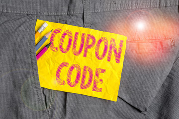 Word writing text Coupon Code. Business photo showcasing ticket or document that can be redeemed for a financial discount Writing equipment and yellow note paper inside pocket of man work trousers
