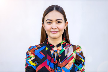 Attractive and happy young woman outdoors