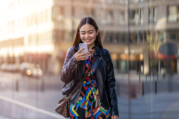 Attractive young woman with smartphone