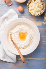 The chef prepares or  making dough for vareniky or pierogi in the kitchen. top view
