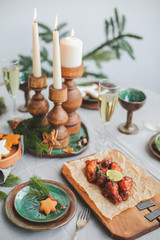 baked chicken for Christmas dinner, festive table setting.