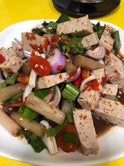 Crab egg salad and lotus root vegetable that is hot and spicy.