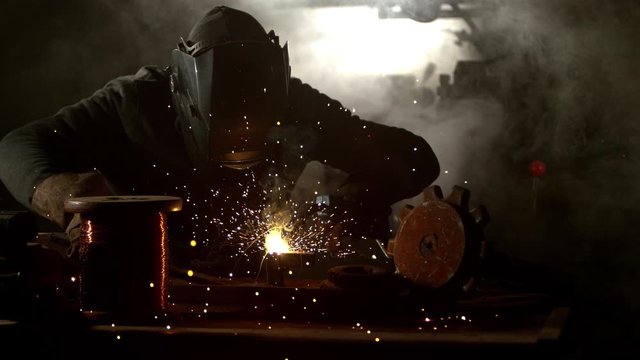 Super slowmotion footage of welding person, 1000fps at 4K