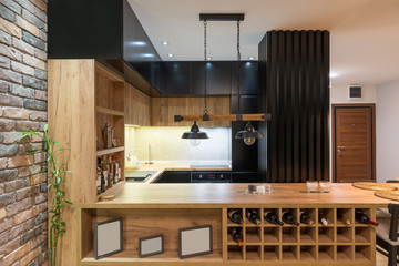 Kitchen and dining area in open plan apartment interior