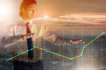 Businessman controlling the market with strings