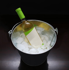 Wine bottle in ice bucket