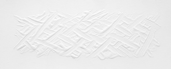 White brush stroke made with a brush on a white background. Texture with a beautiful pattern for a wedding card, retro style for web design.