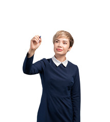 Smiling businesswoman writing on glassboard