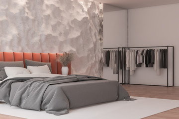 White and pink bedroom corner with clothes