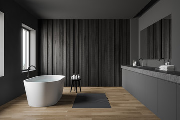 Gray and dark wooden bathroom with sink and tub