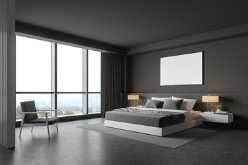 Gray bedroom corner, armchair and poster