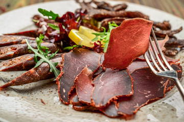 sausageraw smoked meat dump jerky pepperoni sausage, healthy and tasty food.