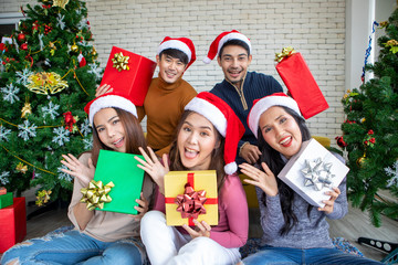 Group asia friends celebrating Christmas and happy new year at home