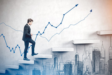 Man climbing stairs, business growth