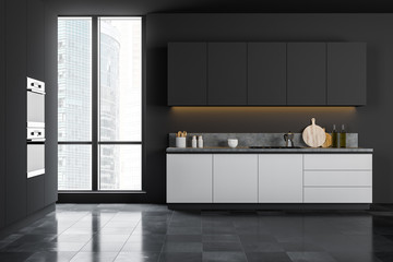 Gray kitchen interior with white counters